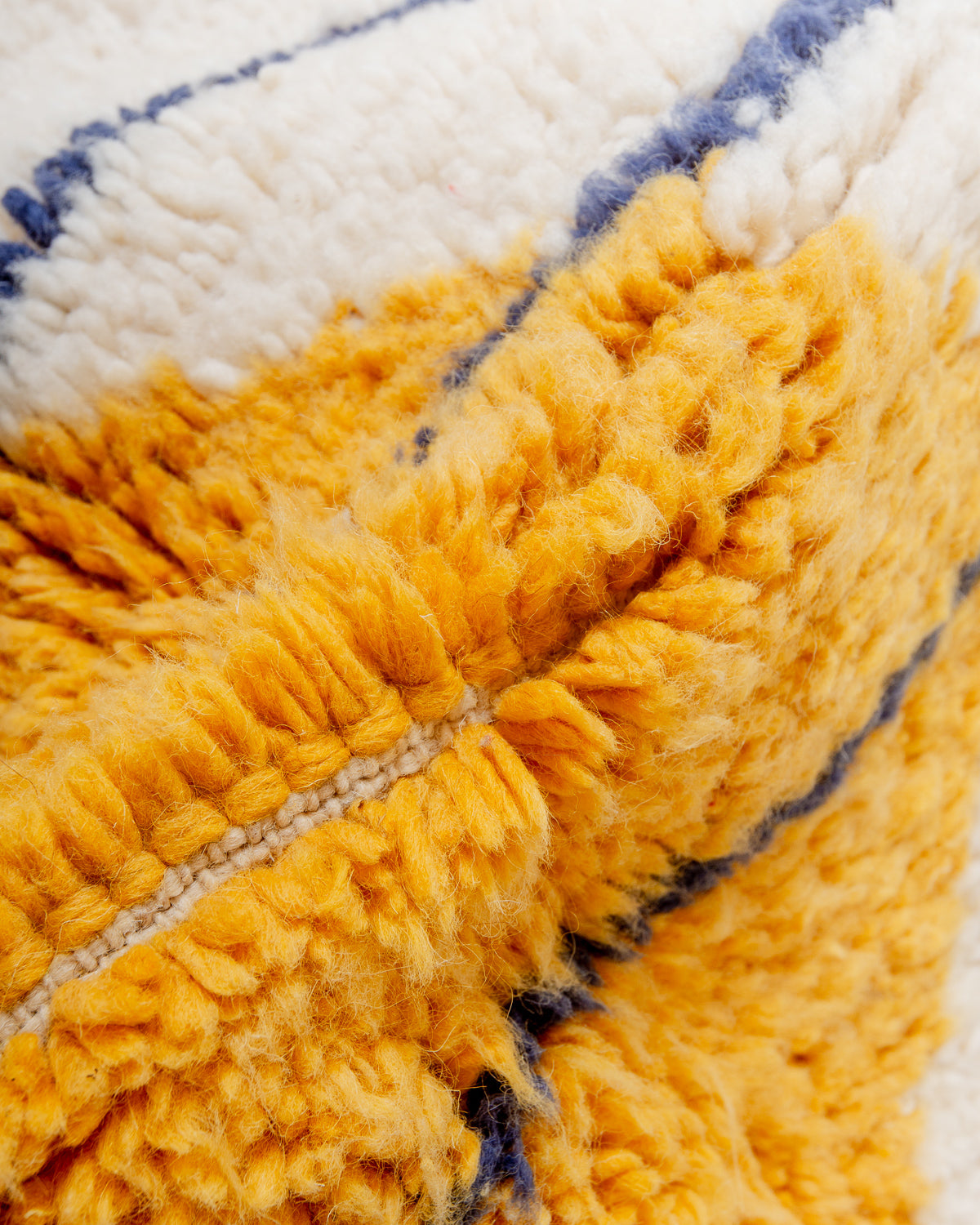 Modern, designer, handcrafted Berber rug from Morocco. Beniourain carpet with beautiful colours and patterns and fluffy wool texture.